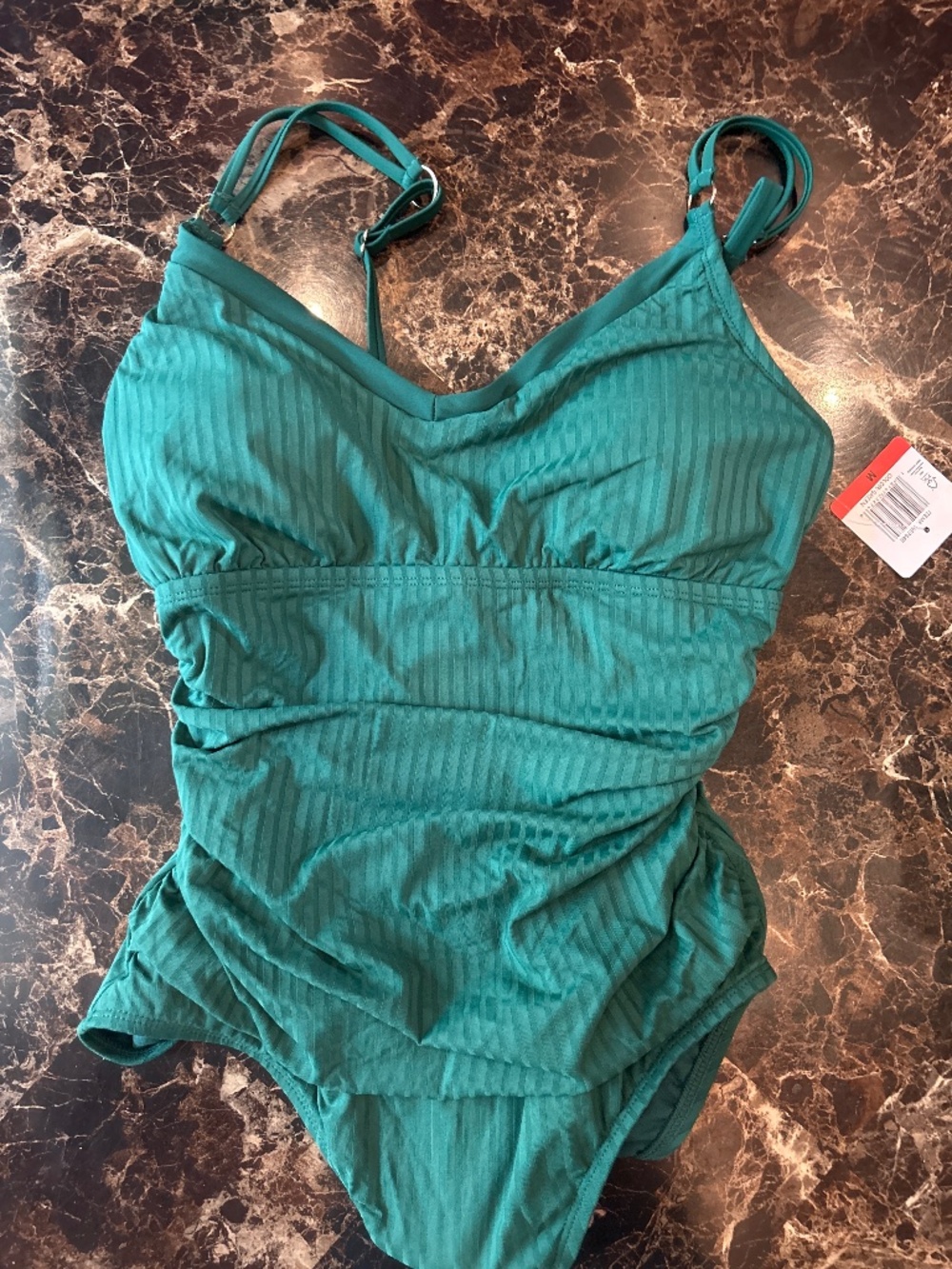 Green women’s swimsuit